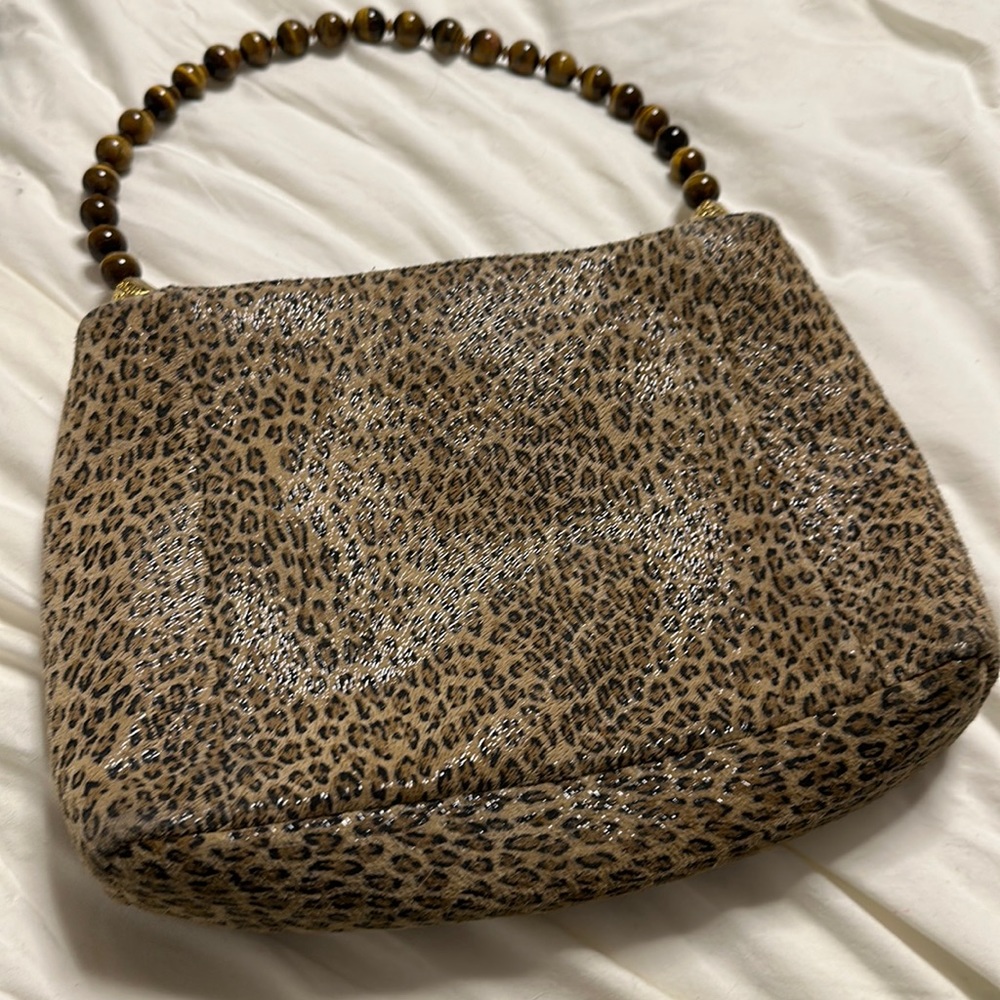 Kenneth Jay Lane bag. Suede leopard with beautiful beaded flexible handle.